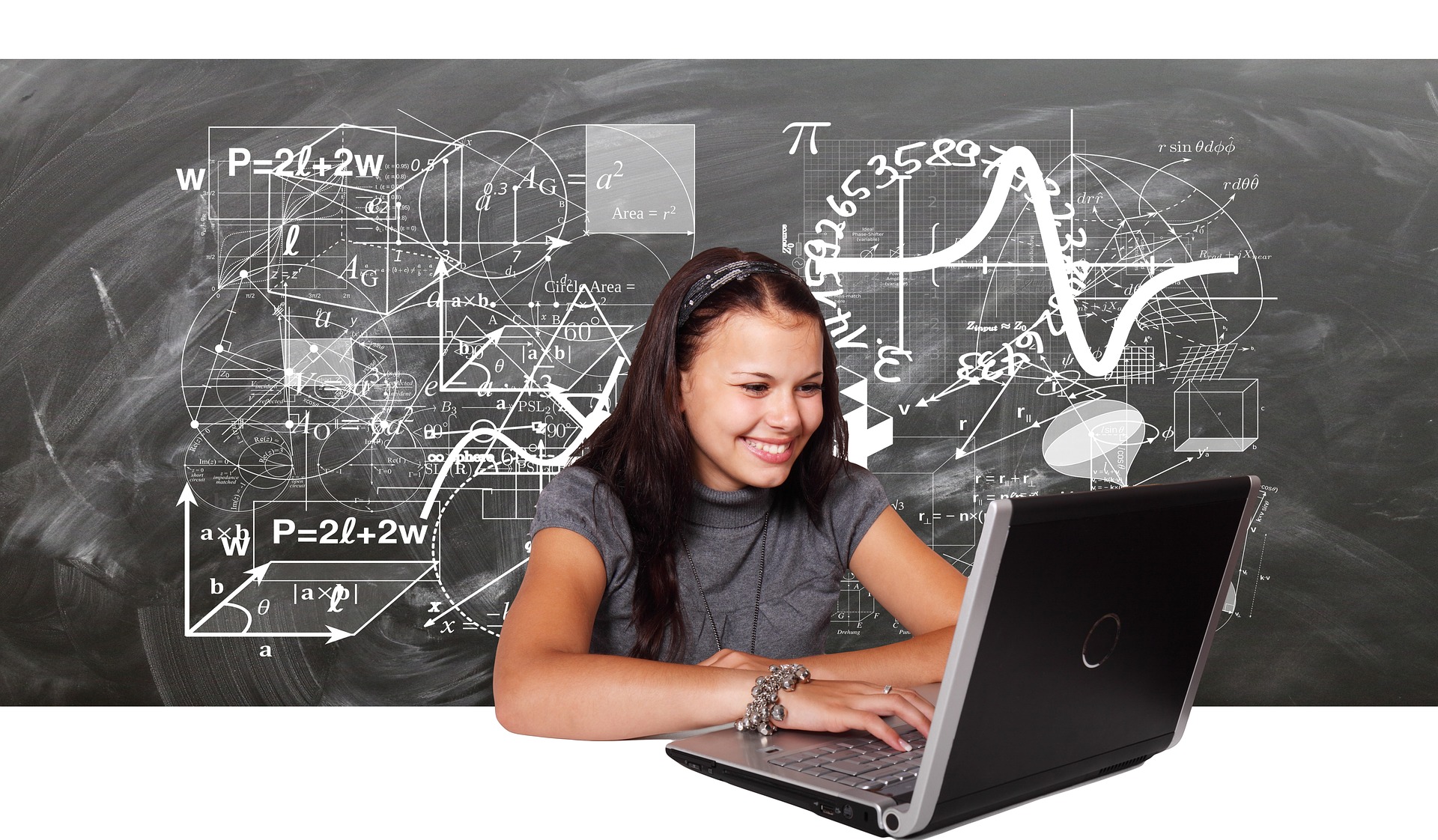 Girl learning math on a laptop